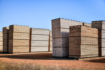 Lumber stacked ready to be shipped to customers.