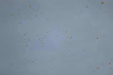 Golden baloons in the sky