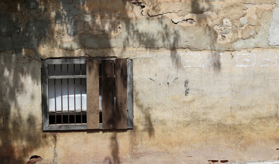 Old cement wall with antique building background