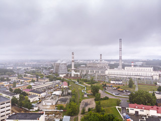 aerial photo of city thermal power station during cloudy weather