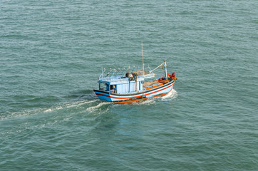 Naklejka na ściany i meble The Asian fishing boat in the high sea