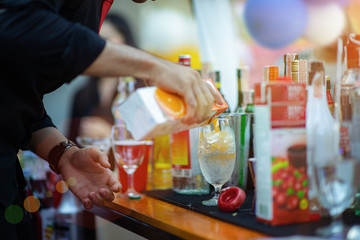cocktail glass mixing fruit with ice serving by bartender for cocktail party, ready for serving party fun and alert enjoy and entertaining