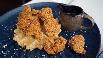 Fried chicken on Waffle served with maple syrup from Monti, Singapore