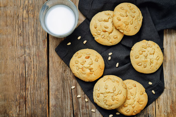 Pine nuts cookies with glasses of milk