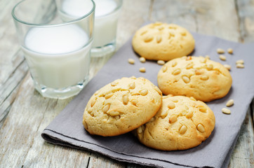 Pine nuts cookies with glasses of milk