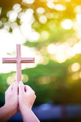 person palm hands to hold holy cross, crucifix to worship. christian in catholic Eucharist bless god ceremony. people and religion concept. image for sign and symbol, background, objects, illustration