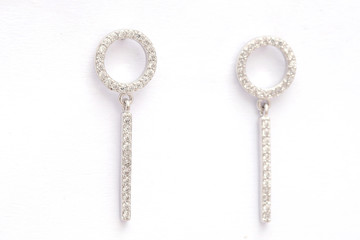 Fashion earring on white background