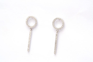 Fashion earring on white background