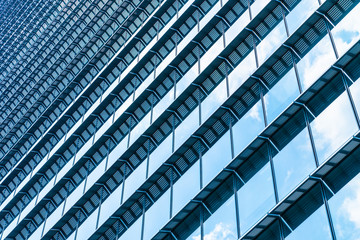Beautiful architecture office building skyscraper with window glass pattern