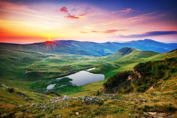 Captivating panoramic view on mountains. Incredible landscape photography, sunrise scene. Location:...