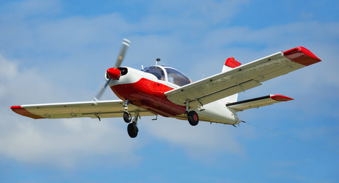 Light aircraft flying in sky