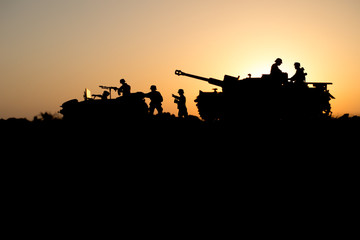 War Concept. Military silhouettes fighting scene. World War German Tanks and soldiers silhouettes...