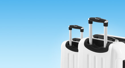 Colorful horizontal banner with two suitcases and copyspace. Travelling concept.