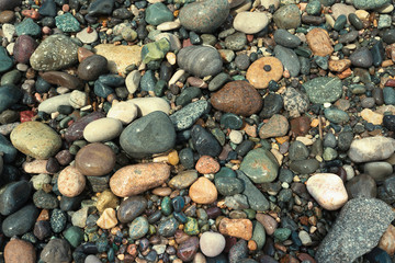 Sea pebble. sea stones background. texture for concept design.