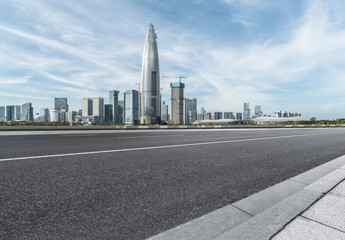 Empty asphalt road through modern city in shenzhen, China