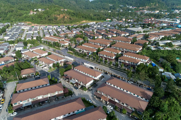 Fototapeta na wymiar Aerial view drone shot of modern houses village in thailand