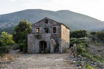 Old abandoned stone-built house in Old Perithia at Pantokrator Mountain, Corfu Island, Greece