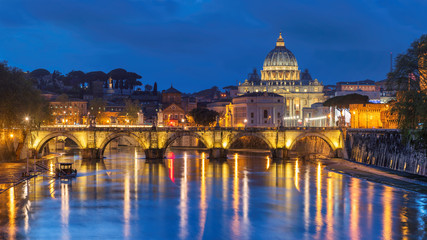 Fototapeta na wymiar Rome at night. St. Peter's cathedral with bridge in Vatican, Rome, Italy.