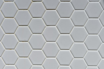 A simple white texture pattern of hexagons as a background