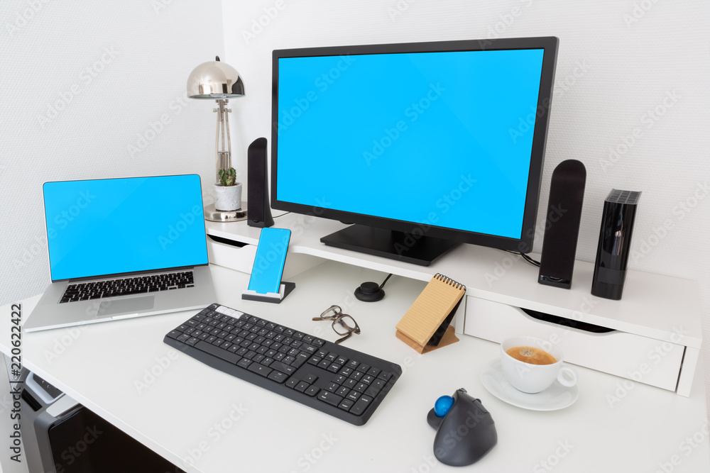Poster computer and devices on modern white desk interior 3d rendering