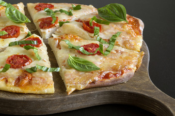 Traditional Italian dish, delicious pizza Margarita.