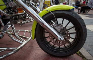 Close up front wheel of motorbike