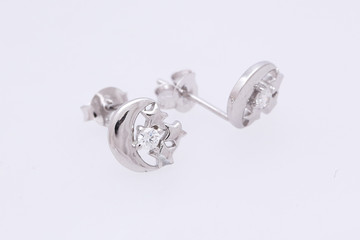 Fashion earring on white background