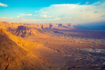 View from Masada at the valley and Dead sea in the Judaean Desert in the early morning. Israel