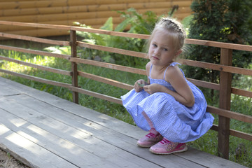 the little lovely girl in a green dress