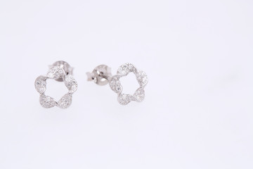 Fashion earring on white background