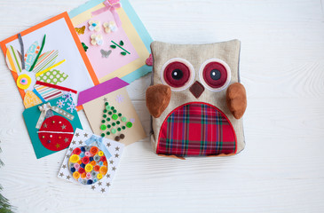 Postcard from paper flowers. Scrapbooking, creative mess. The view from the top.