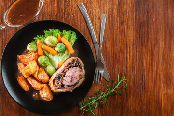 Pork tenderloin in wellington style in puff pastry