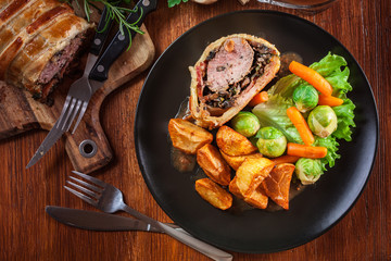Pork tenderloin in wellington style in puff pastry