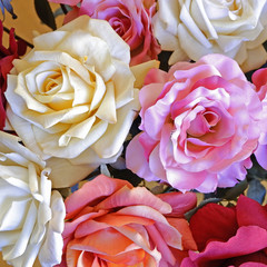 colorful fake rose flowers top view