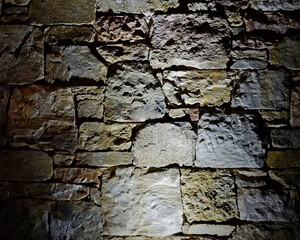 illuminated stone wall background, space for typing