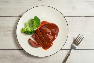 Grilled Beef Steak on the wooden table