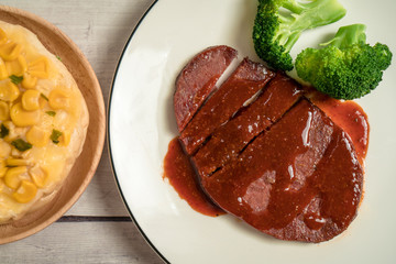 Grilled Beef Steak on the wooden table