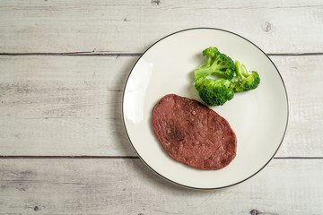 Grilled Beef Steak on the wooden table