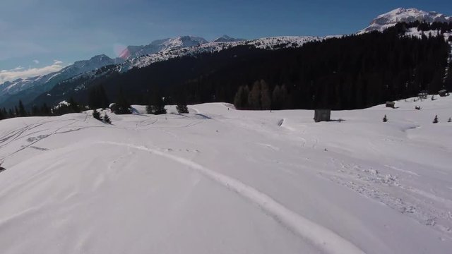 Winter holidays, man skiing and falling down in mountains, action camera footage