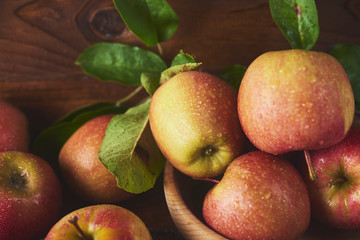 Fresh ripe apple over wooden background