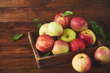 Fresh ripe apple over wooden background