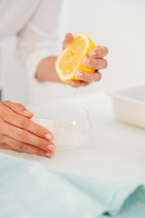 Woman preparing an aloe vera gel recipe with essences. Healthy, natural and cosmetic concept