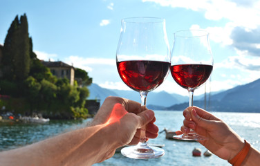 Two wineglasses. Varenna town at the lake Como, Italy