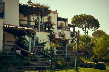 Fototapeta premium Traditional White houses on the slopes of the mountains, the coast of the Aegean Sea of Turkey. Turgutreis , Bodrum.