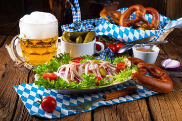 delicious bavarian sausage salad with onion and cucumbers