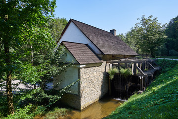 Water powered old historic blacksmith workshop or smithery in Czech Republic. Fully equiped and working with anvil, tools and hammers and also with charcoal forge.  