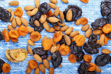 dried fruits are scattered on the table