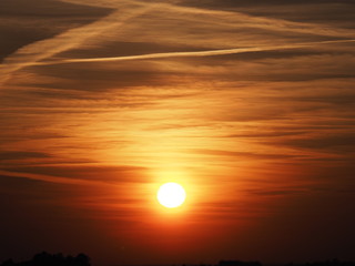 Obraz premium Cool sky at sun set with clouds formation seen in spring evening from european city in Poland