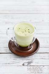 Matcha green tea latte in glass cup