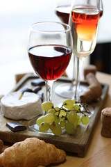 Wine, croissant, cheese.